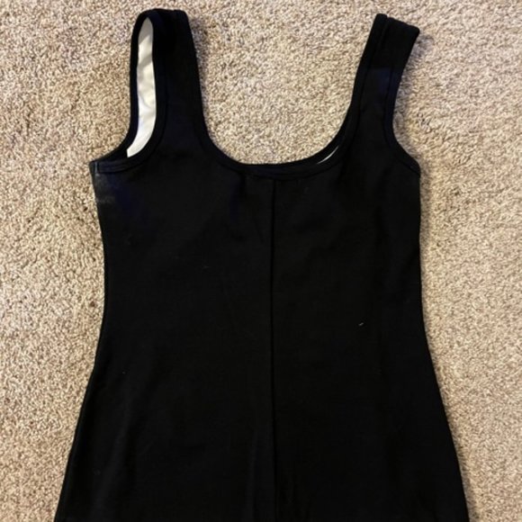 Black and White Cool top.  Pull-on style with a slimming lines. - Picture 2 of 2